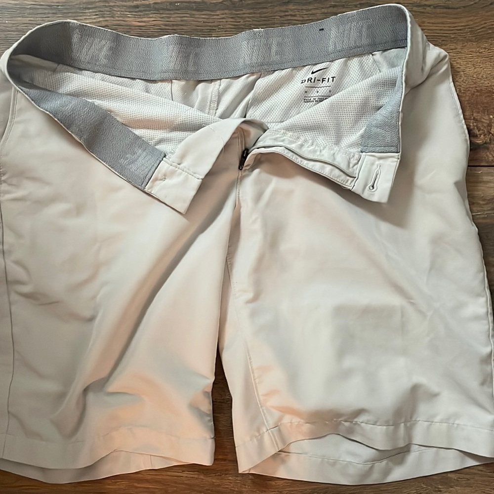 NIKE Dri-Fit golf shorts.